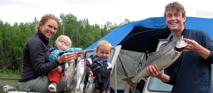The Mason family fishing pink salmon on an Alaska river