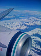 Alaska Airlines over the Alaska mountains