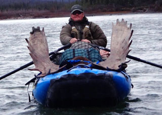 Pro Pioneer canoe with moose meat load